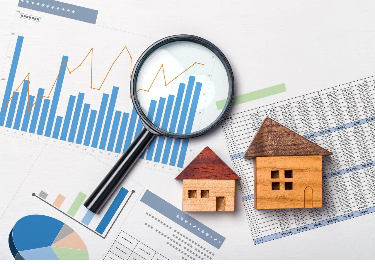 magnifying glass looking at documents