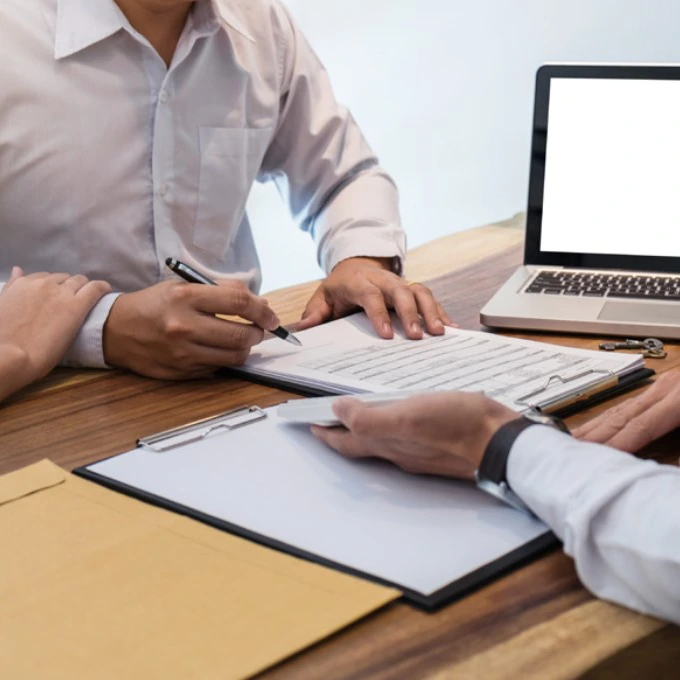 Pic of people negotiating sale price