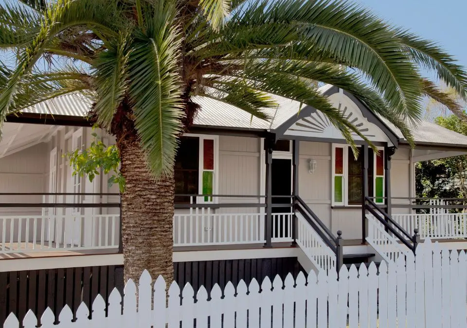 house with a white picket fence
